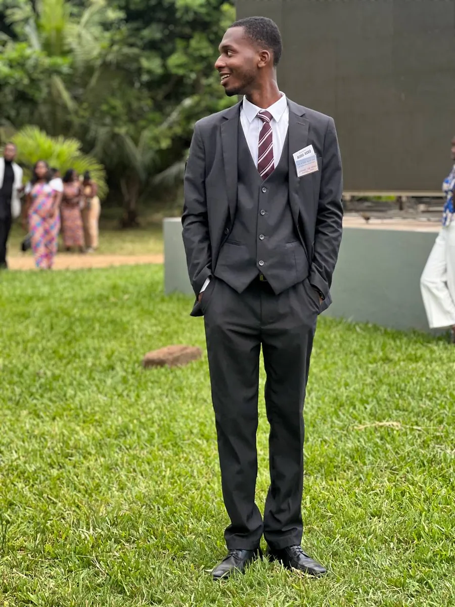 Candid photo of Leonard in a suit